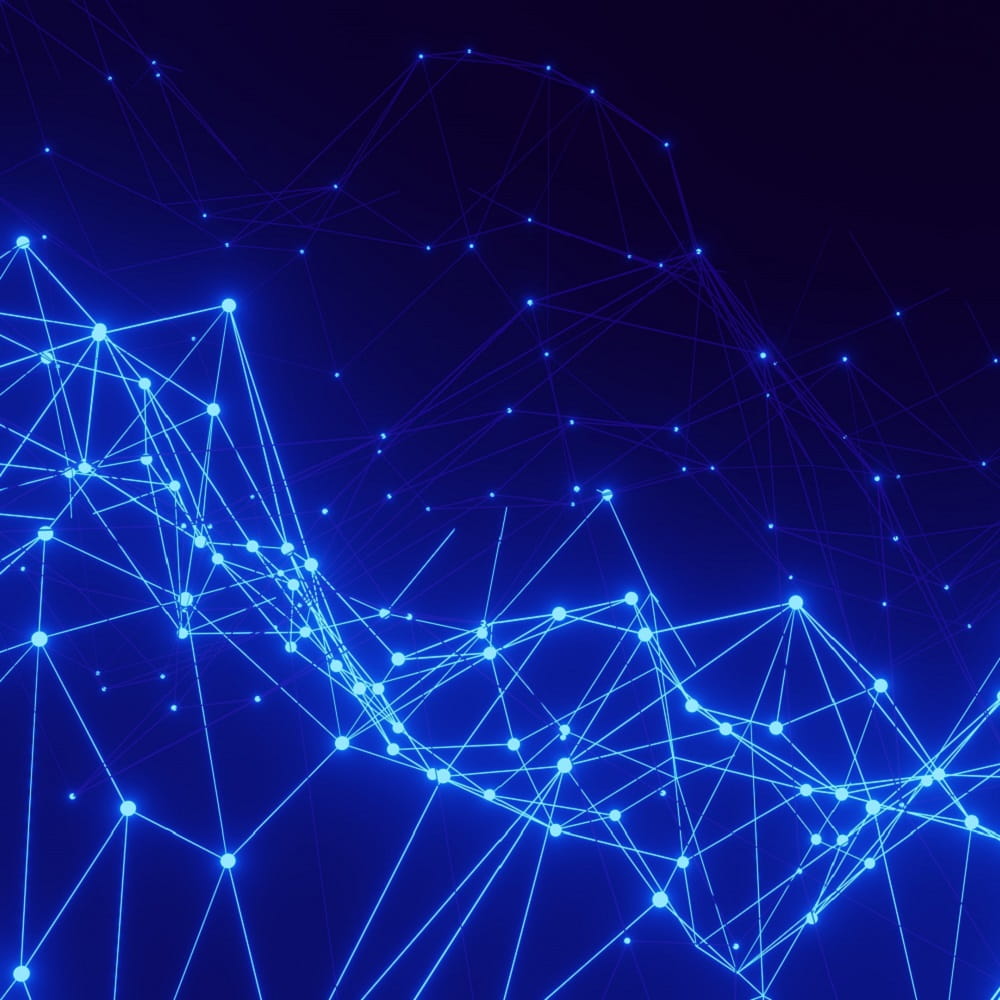 A digital network illustrated by points of light, connected with bright lines.