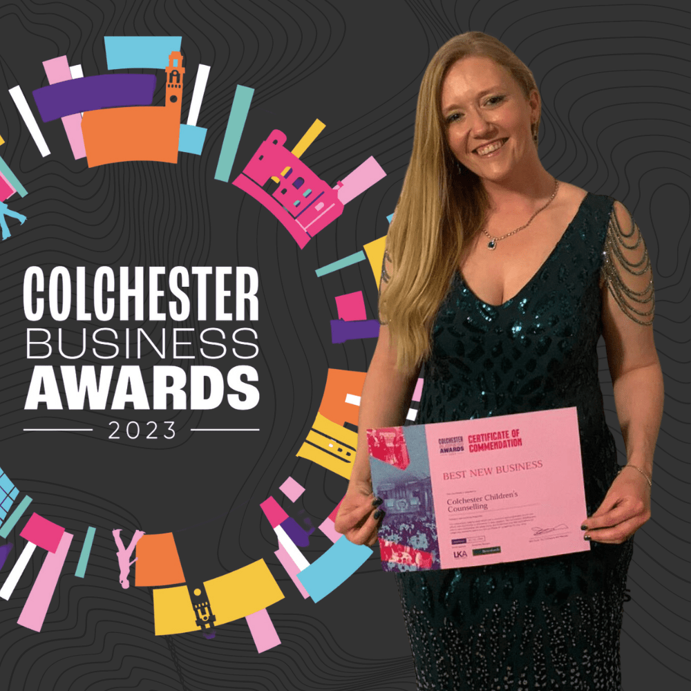 photo of Amanda Hitchin with Colchester Business Awards 2023 ogo