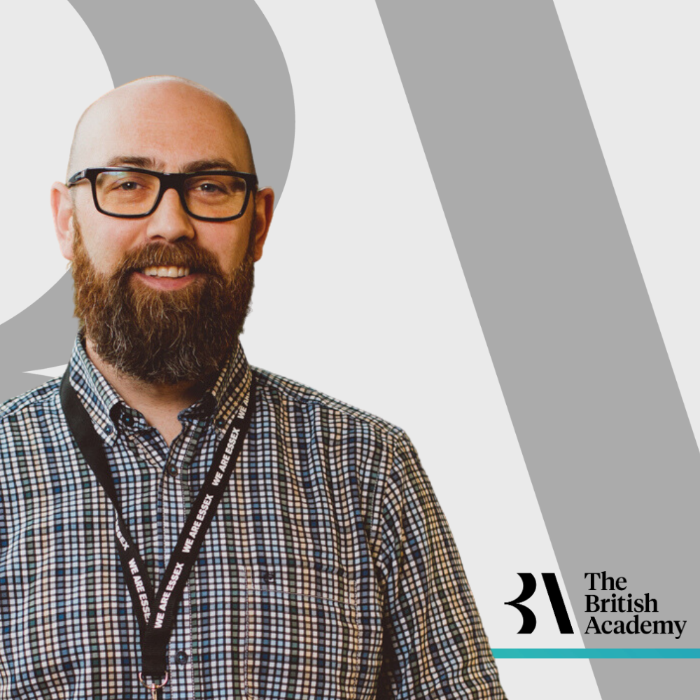 Dr Christopher Bundock against a British Academy background