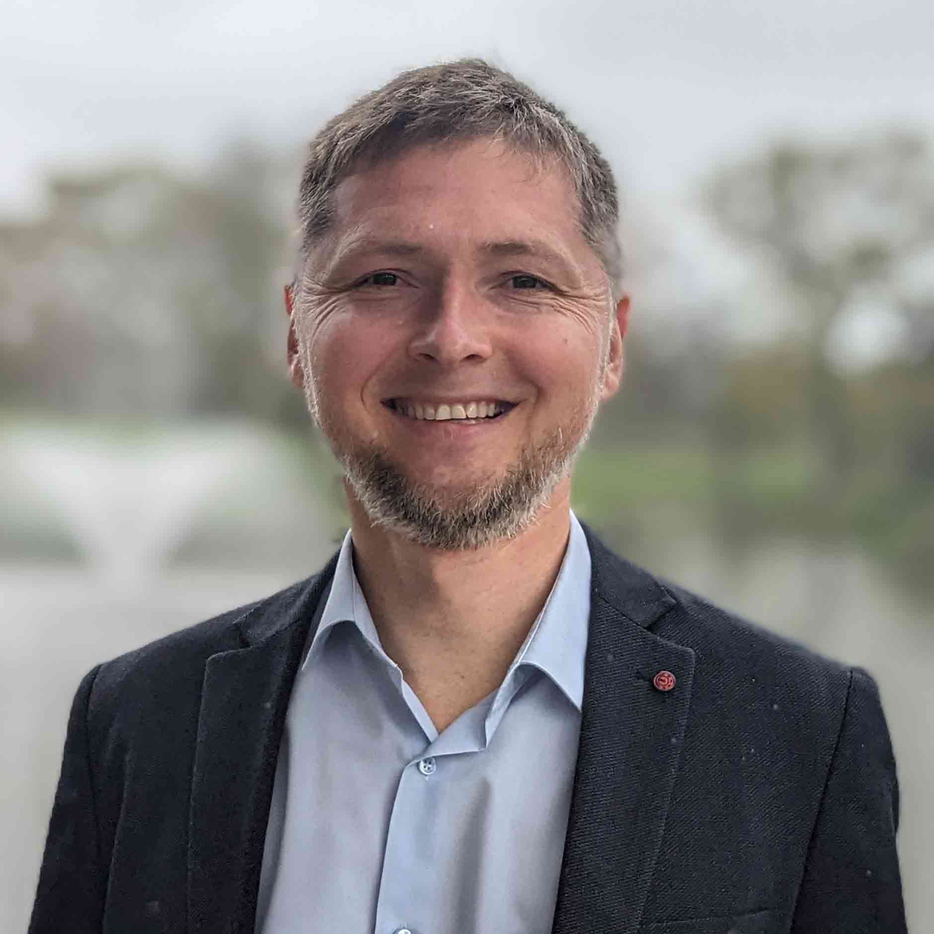 Dr Makysm Balaklytskyi looking relaxed and happy 