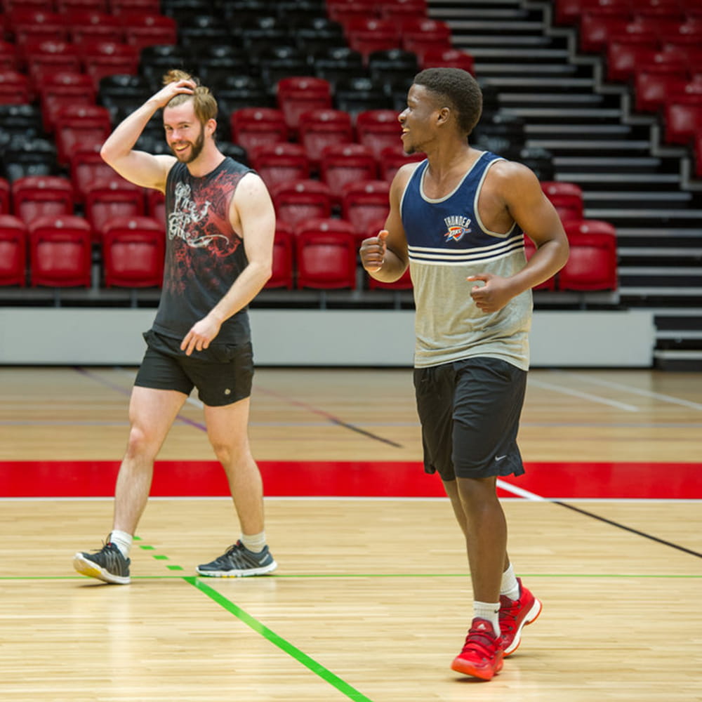 Students playing basketball