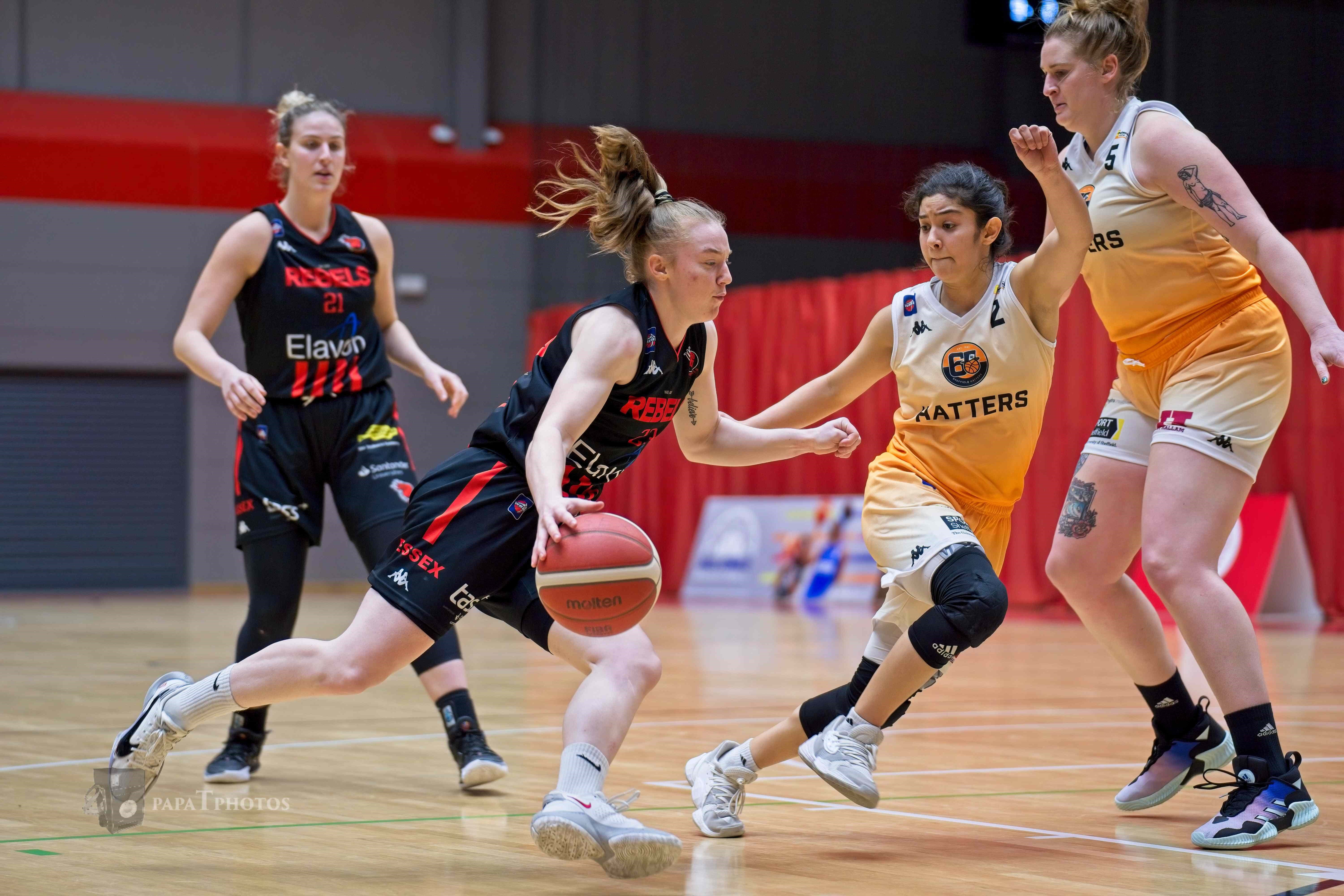 Group of people playing basketball