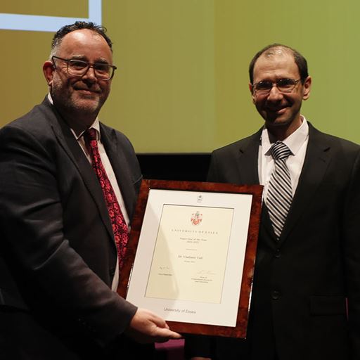 Dr Vlad Teif receives his award from Professor Shane Martin