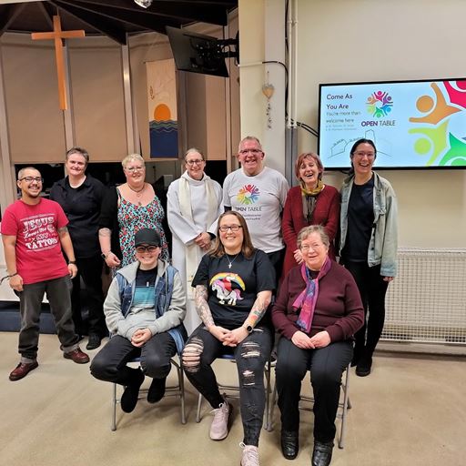 OTN Coordinator Kieran Bohan with Revd Dr Sara Batts-Neale and a group of people.