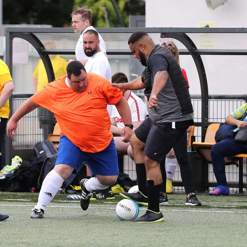 Two men playing football