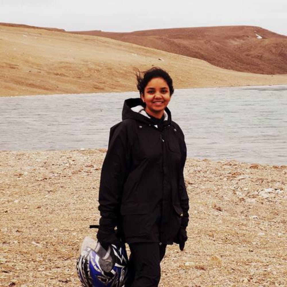 Ansuhree Srivastava standing in the desert whole working on the Mars simulation mission