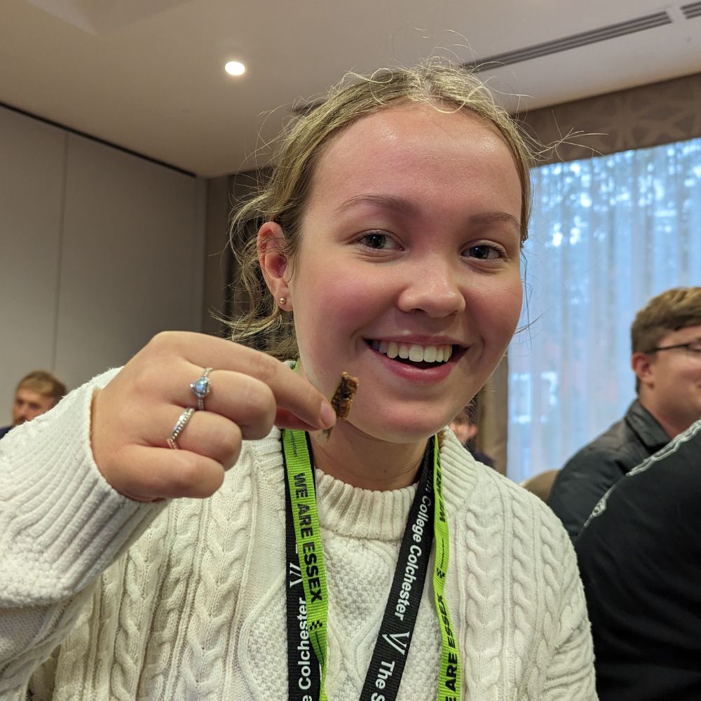 Maisie Petts, 16, prepares to eat a bug