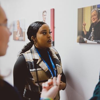 looking at a picture of Lady Hale in the Law School corridor
