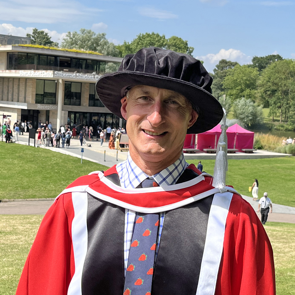 Chris Newenham in his Honorary Graduate robes