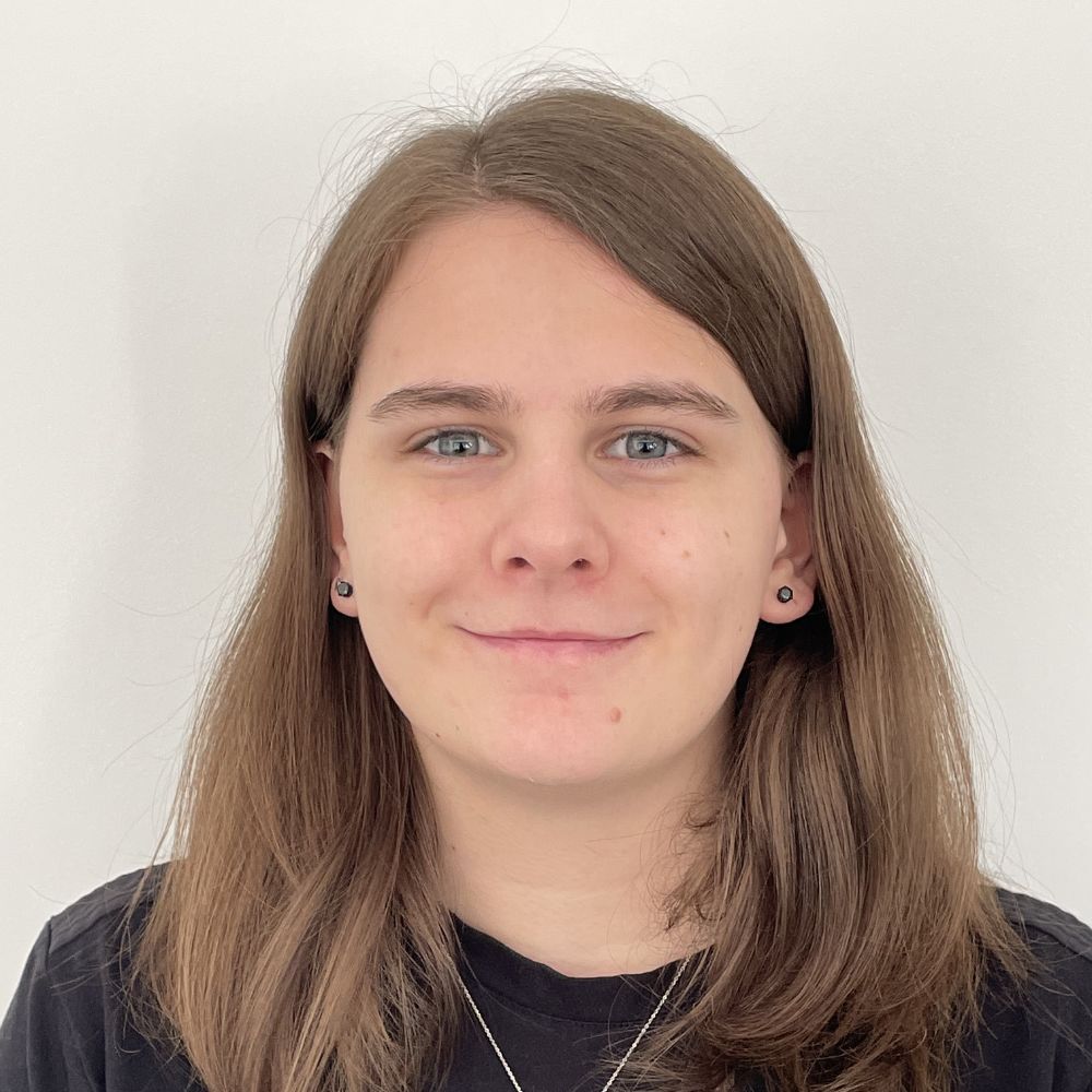 Isabelle Nagle, smiling against a plain background