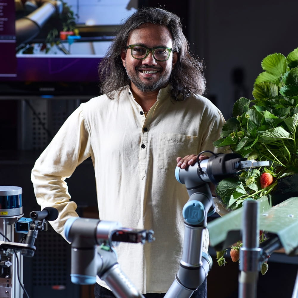 Dr Vishwanathan Mohan with the strawberry-picking robot