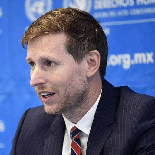 Dr Matthew Gillett speaking at a United Nations press conference