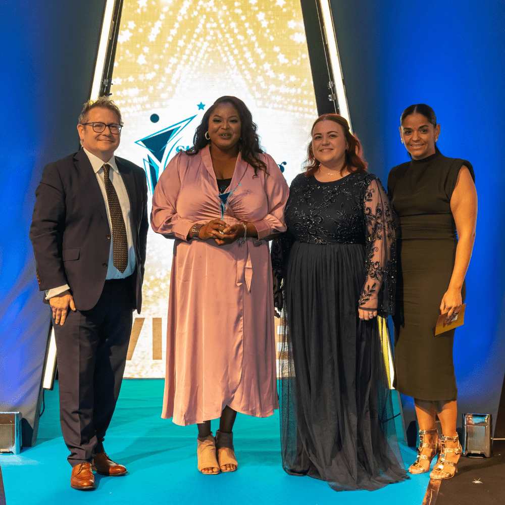 Sunny Atkinson (centre left) collecting her award at the Student Nursing Times Awards ceremony
