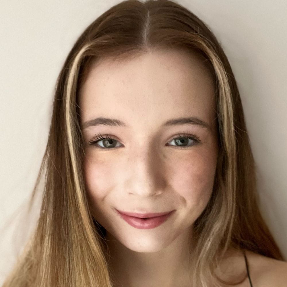 Flo Blower smiling at camera