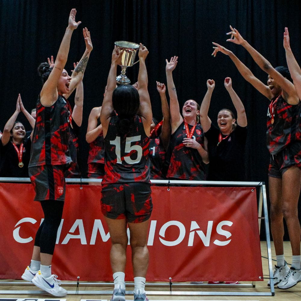 The basketball team celebrate