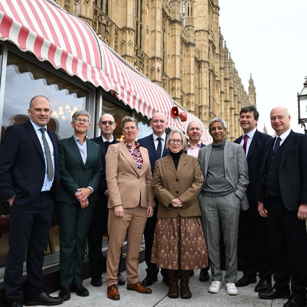 Vice-Chancellors from 10 universities stand outside the Houses of Parliament