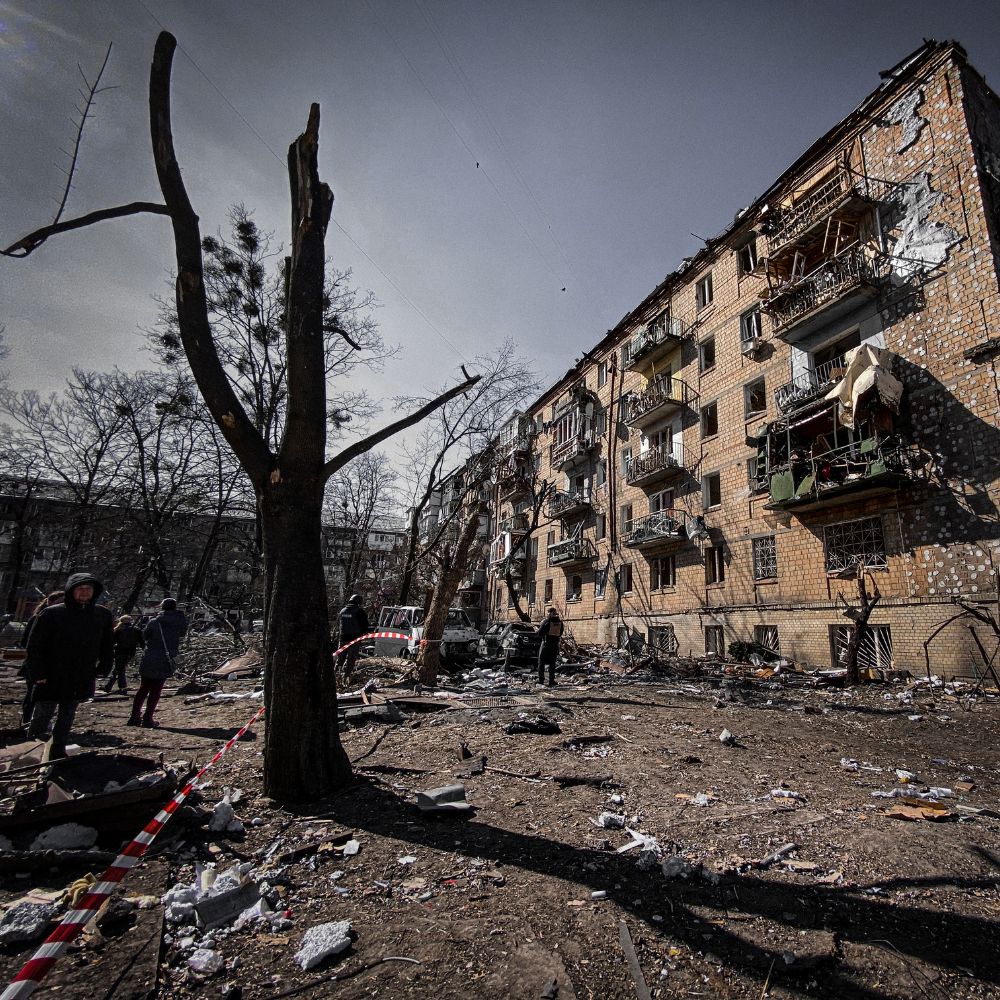 block of flats badly damaged by bomb