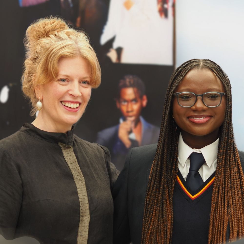 University of Essex Chancellor Dr Sarah Perry with a Southend schoolgirl, both smiling