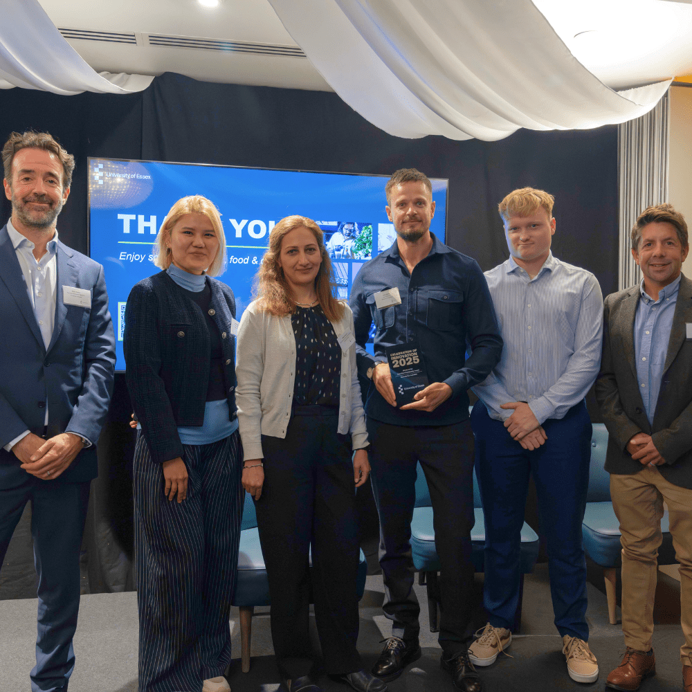 Pro Vice-Chancellor for Research Professor Chris Greer with Best Short Project winner Schools Out