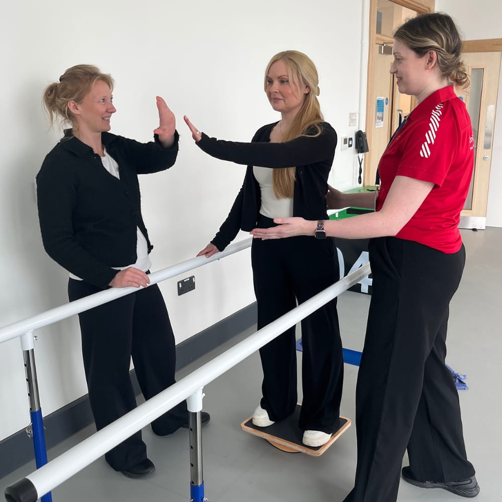 A service user taking part in some balancing exercises at the Hub