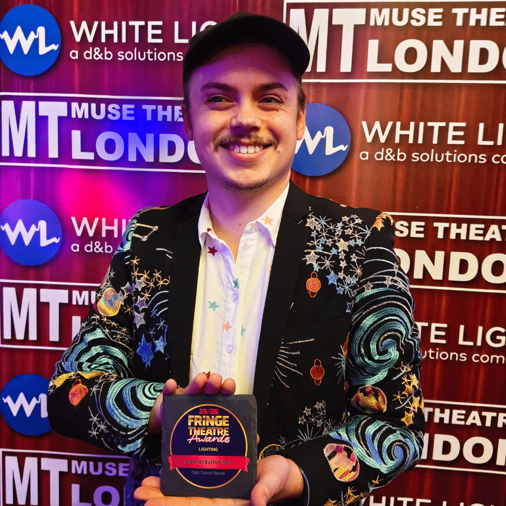 Samuel Button-Bell with the Fringe Theatre Award