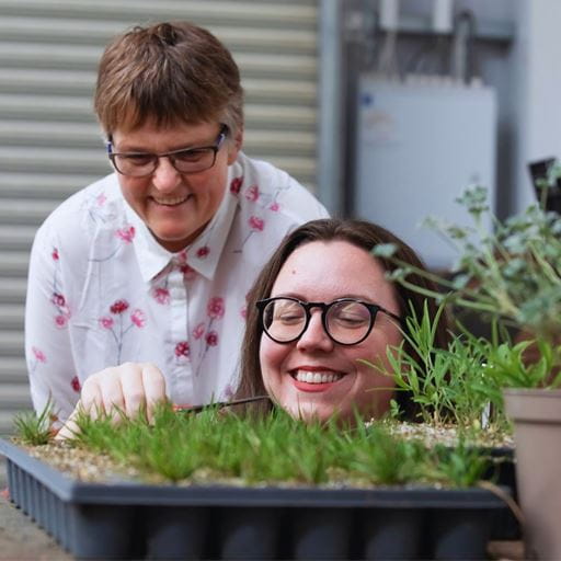 Professor Tracy Lawson and Dr Amanda Cavanagh examine some plants