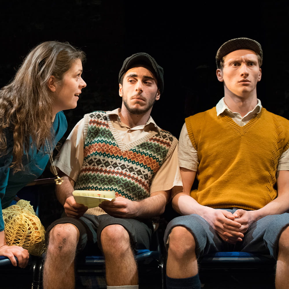 Three acting students sitting and talking