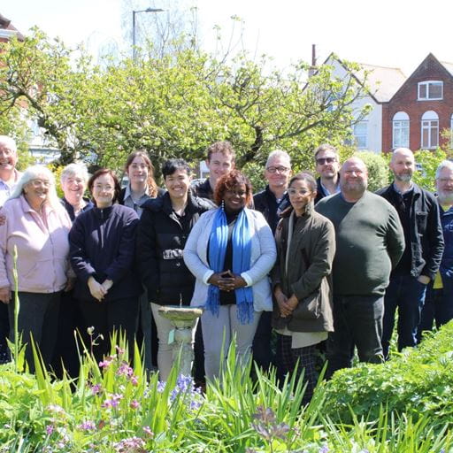 Members of the group working on new museum in Frinton standing together in a garden