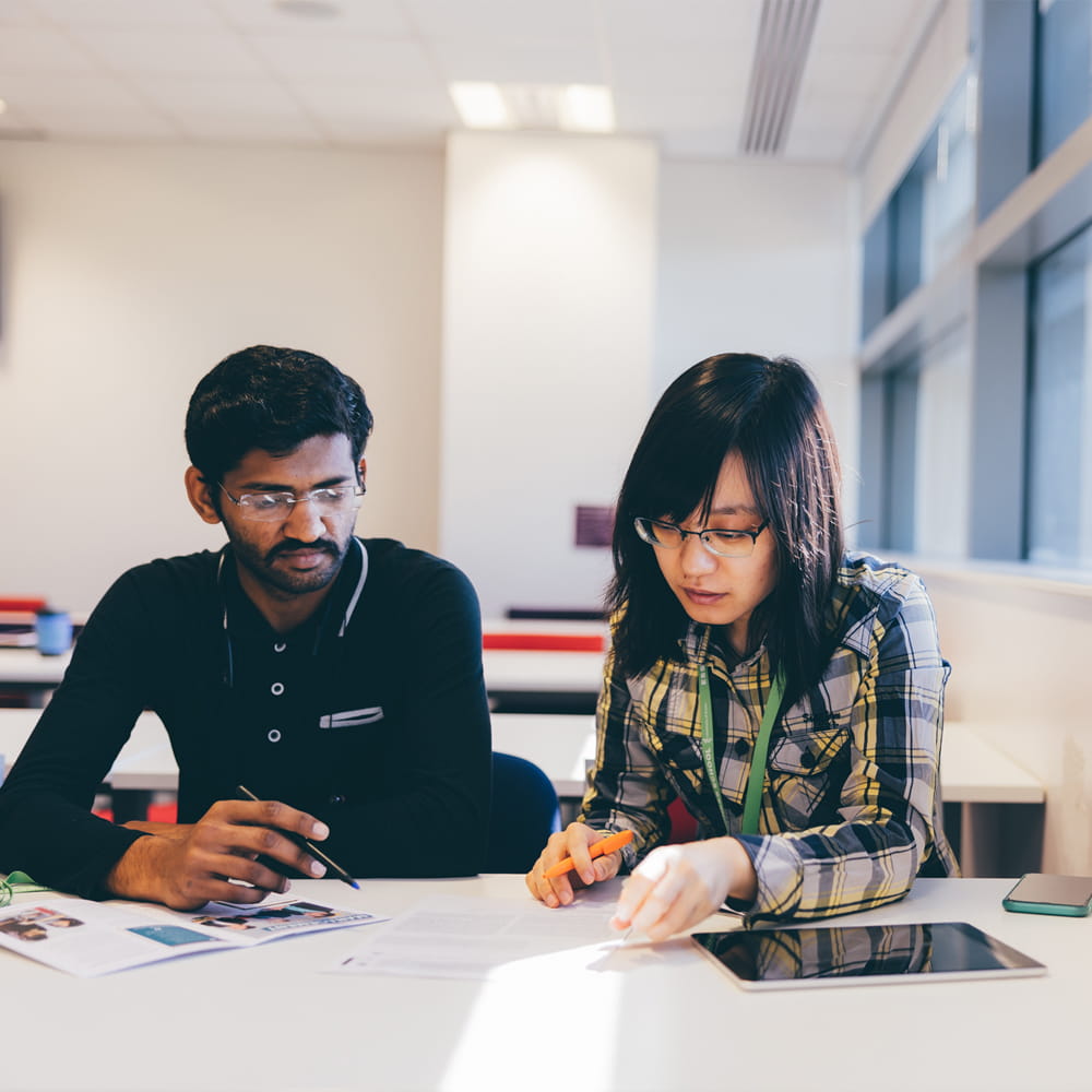Two research students discussing ideas 