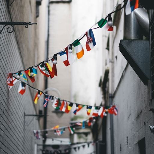 Bunting with country flags hanging in a street
