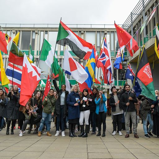 International students with their countries flags
