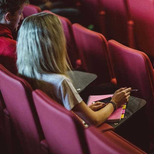 Students sitting in a lecture theatre