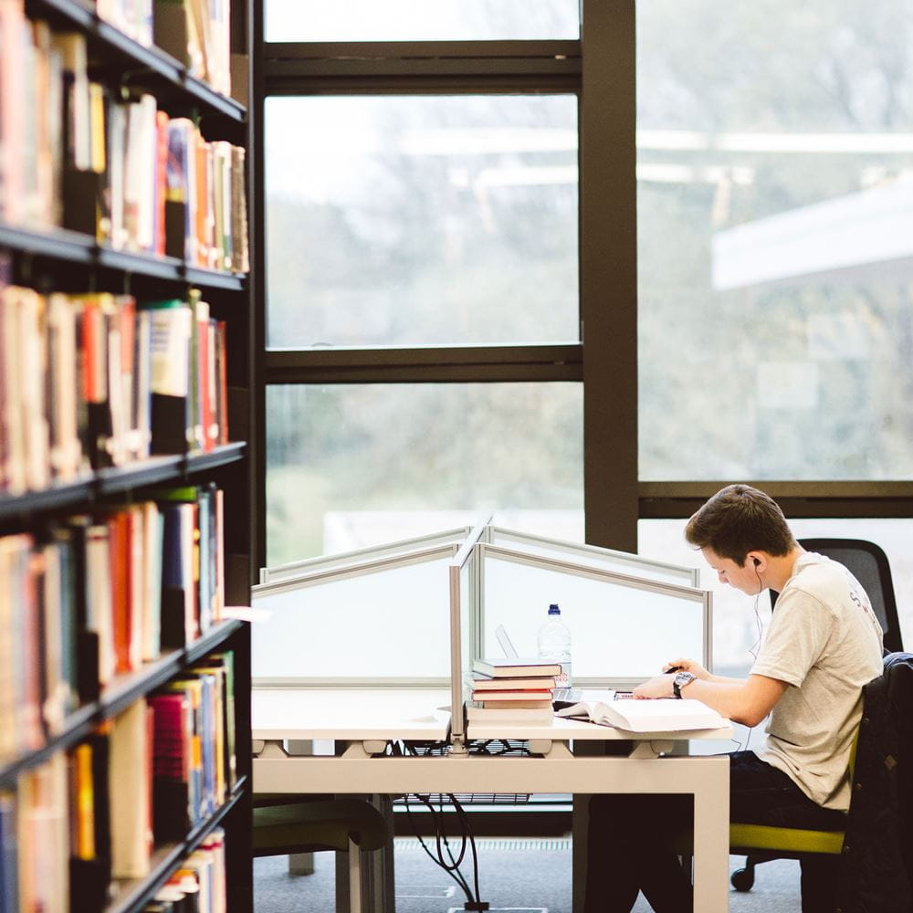 Male student in library