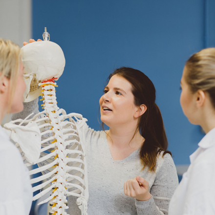 Health and Social Care Students with skeleton