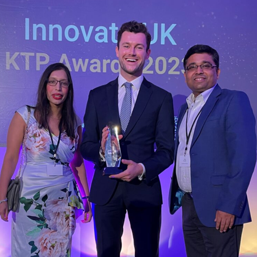 Joshua Arrowsmith and Essex research team holding award at Innovate UK KTP Awards