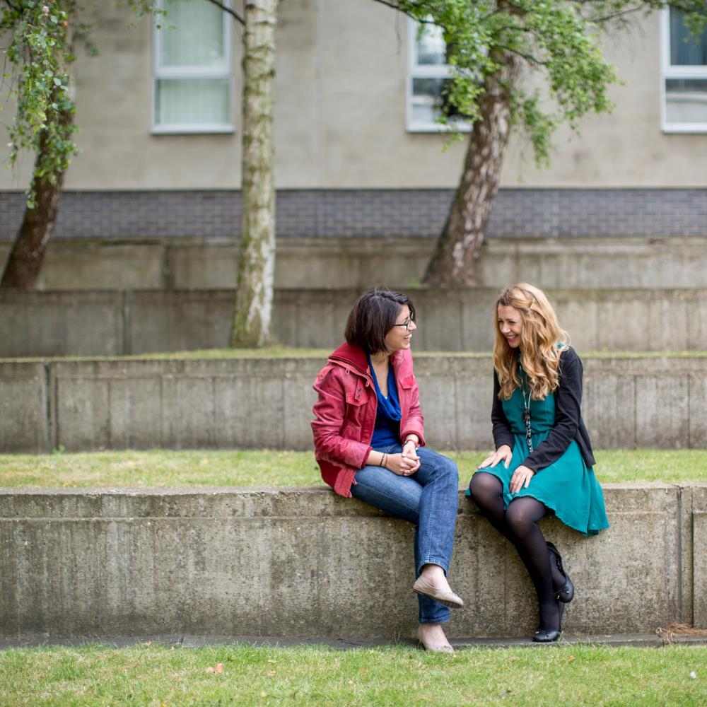 Student chatting in the Secret Garden
