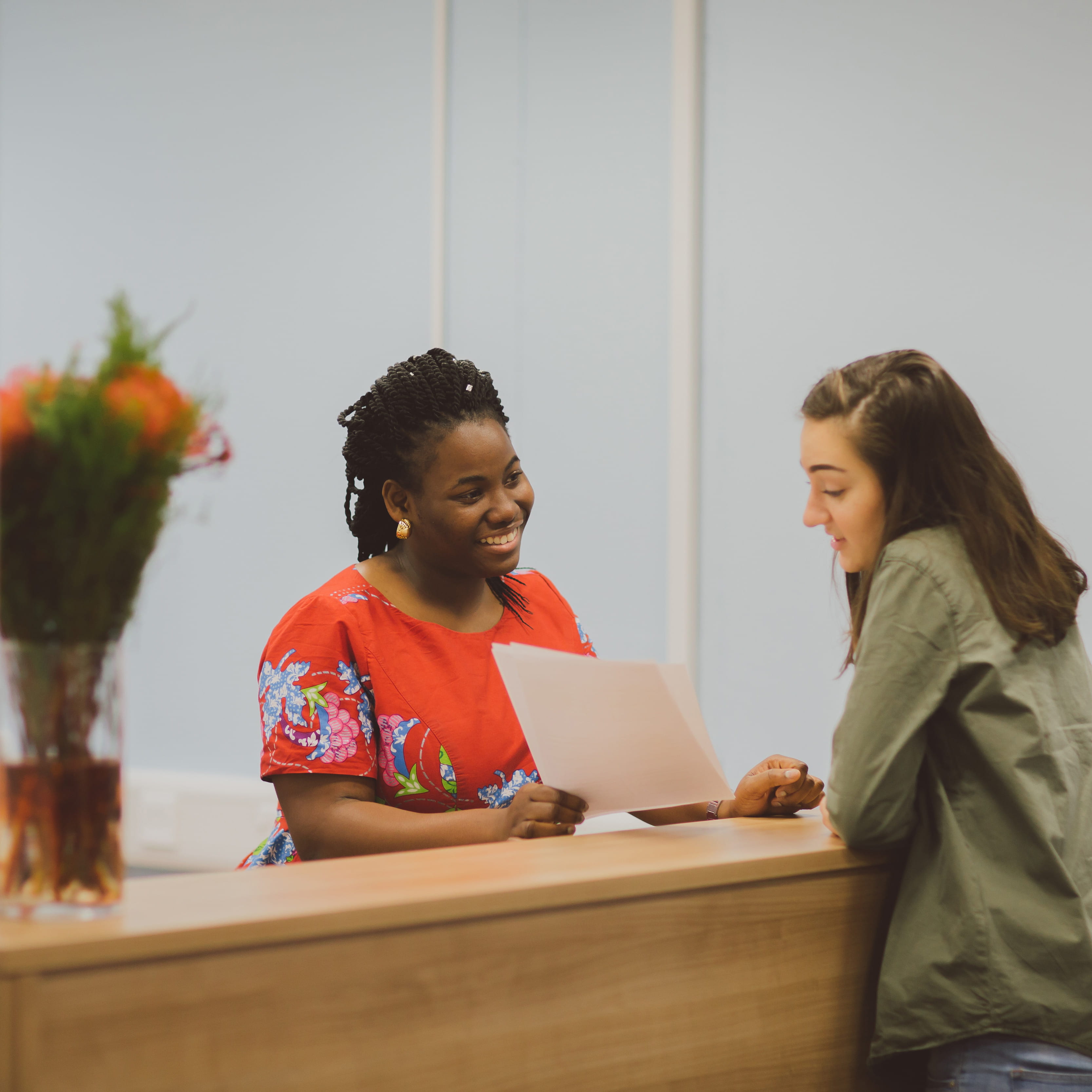 Student at reception desk