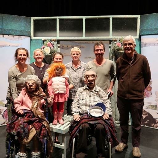 Group photograph of the cast and puppets from Az2b Theatre Company and staff from the School of Health and Social Care
