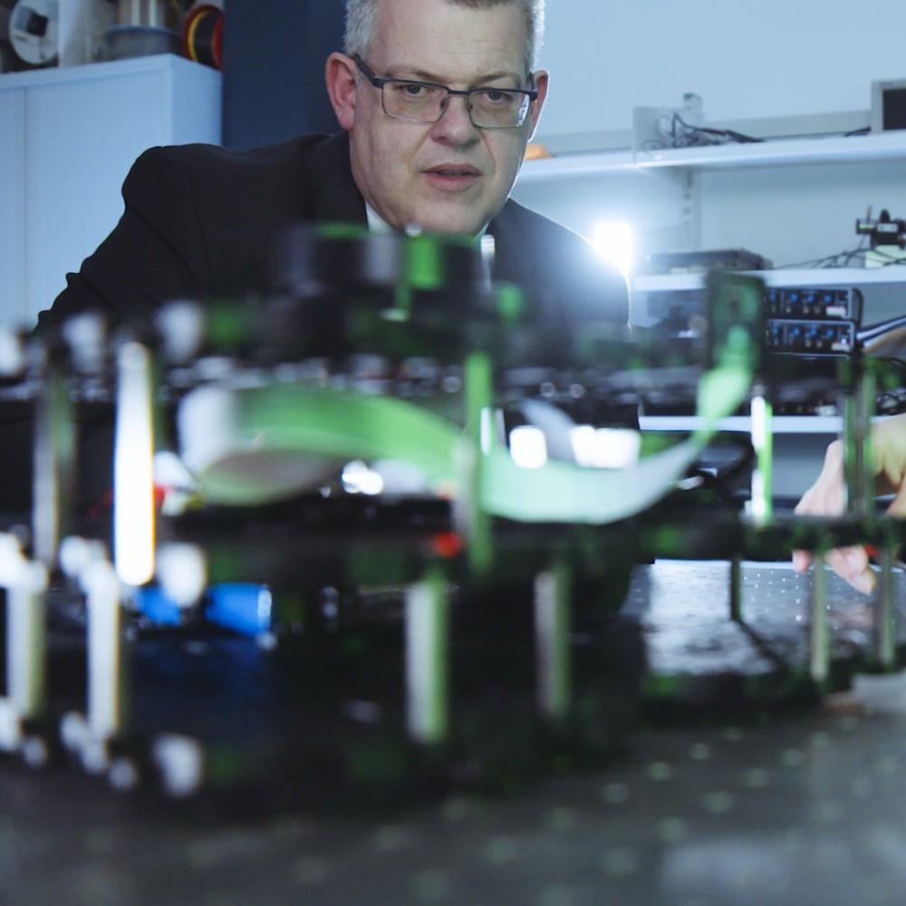 An researchers working on a robot