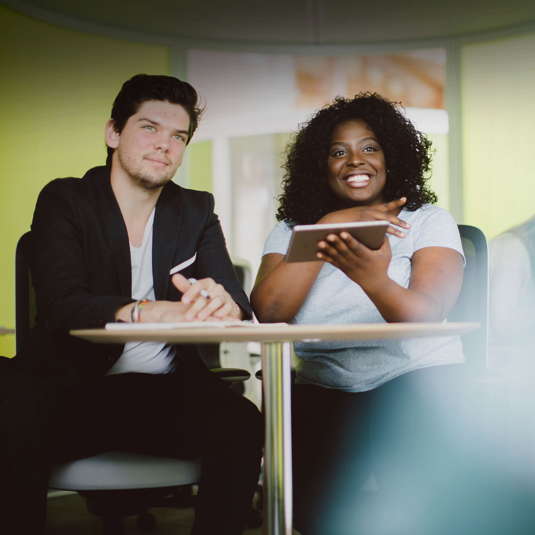 Students using iPad staring