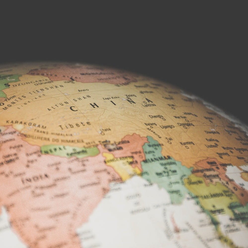 Part of a globe, with south-east Asia and China visible.