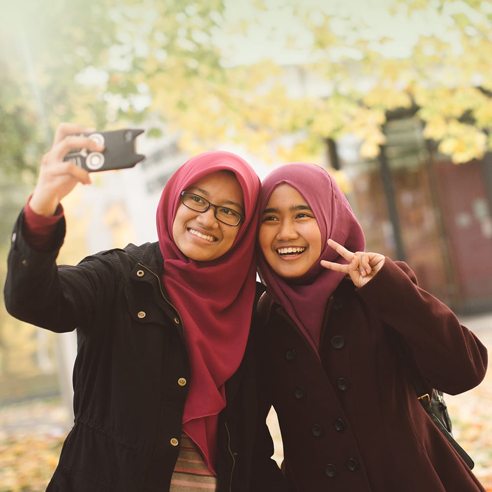 Students taking a selfie on campus