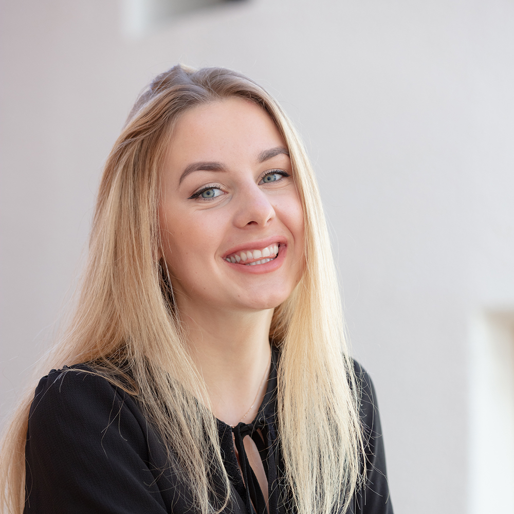 BSc Business Management (Including Year Abroad) student, Viktorija Povilaityte, smiles inside the Essex Business School building