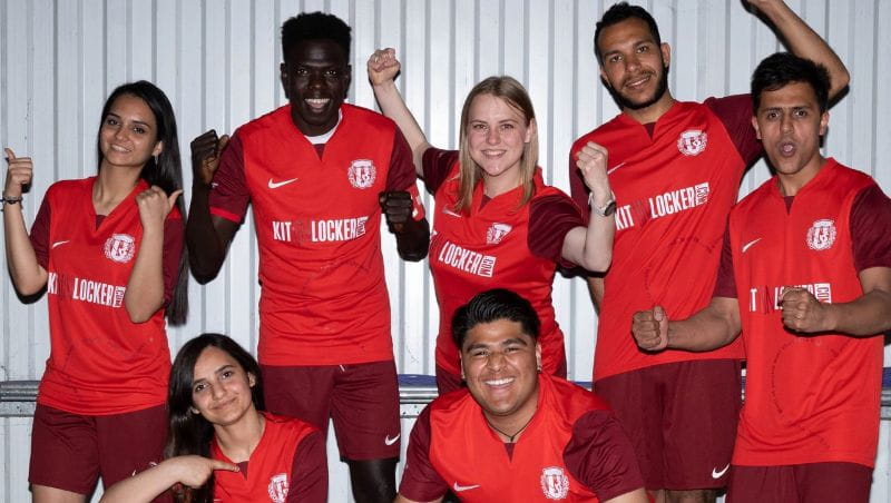 Refugees playing football as part of the Changing Lives programme