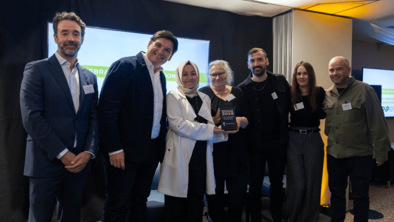Pro Vice-Chancellor for Research Professor Chris Greer with Best Third Sector Partnership winners Pursuing Independent Paths