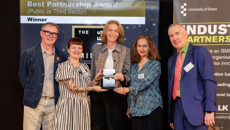 The Minories being presented their award