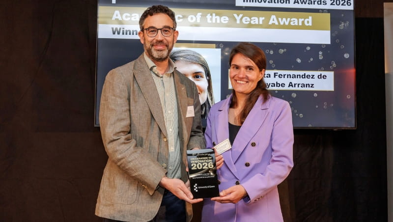 Photo of Dr Marta Fernandez de Arroyabe being presented their award
