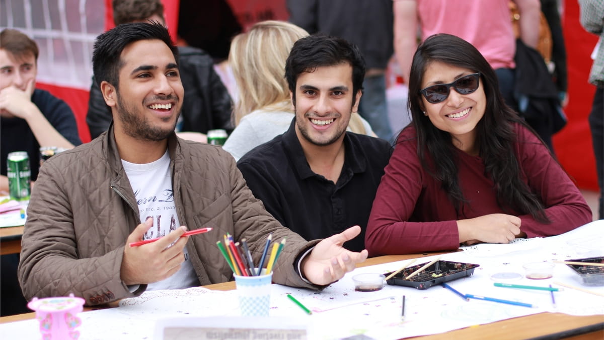 People at street party smiling