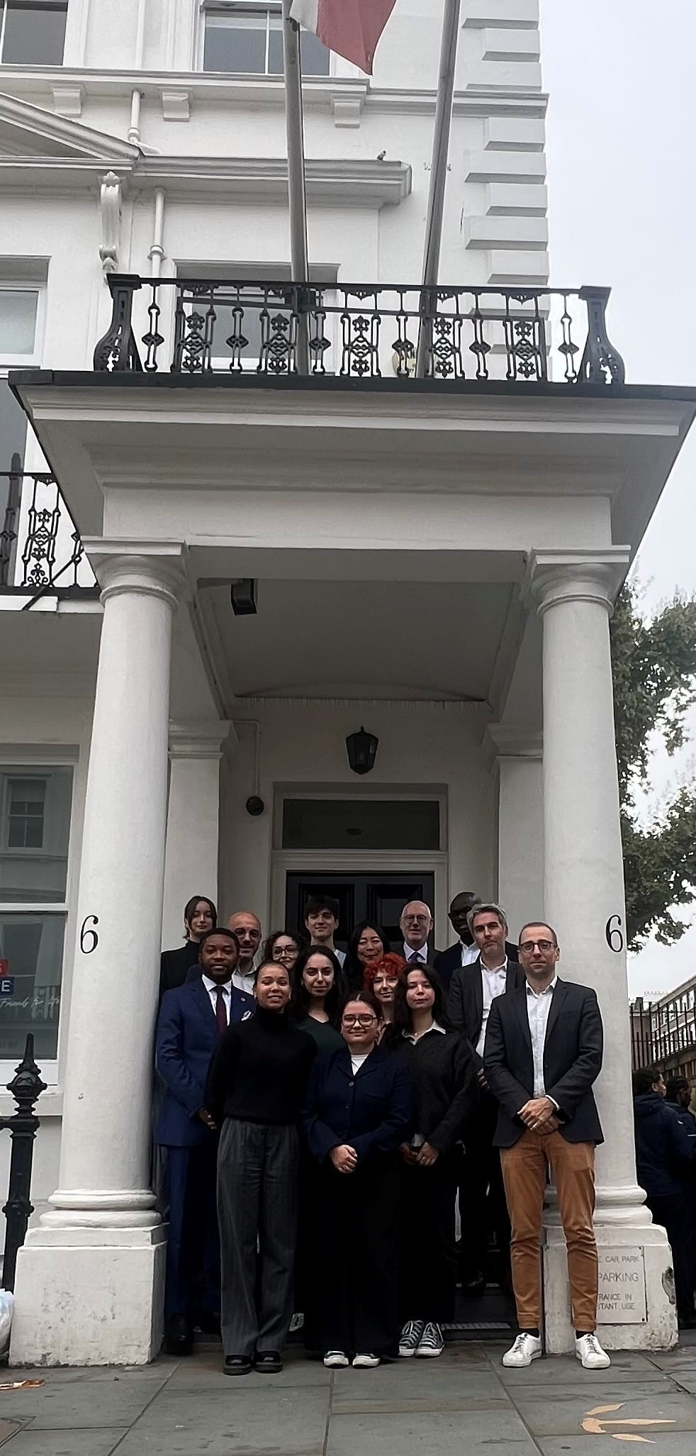Students and staff outside french embassy in london