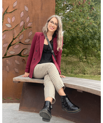 Vanessa Topp at the University of Essex, stat on the memorial bench